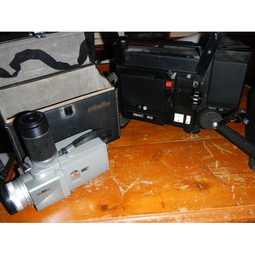 814 - A quantity of projectors and a Yashica 8mm editor.