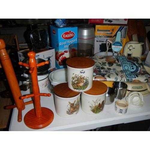 827 - A mixed lot of kitchen ware including scales, mixer etc.,