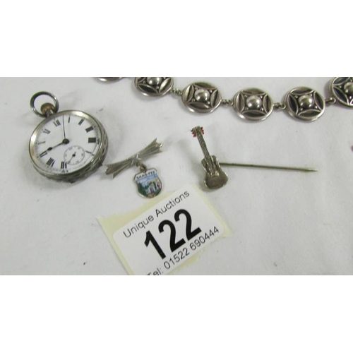122 - A silver fob watch, a silver bangle and further jewellery items.