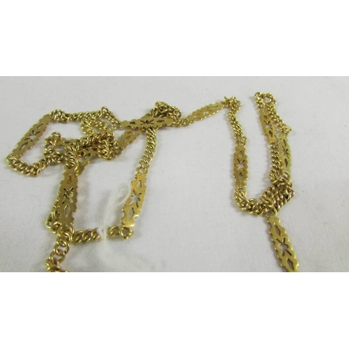 131 - A necklace on long chain, (tests as 24ct gold) 30 grams.