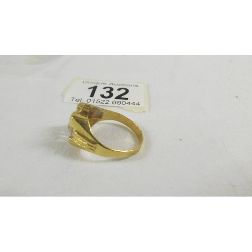 132 - A  ring set white stone (tests as 24 ct gold) size S.