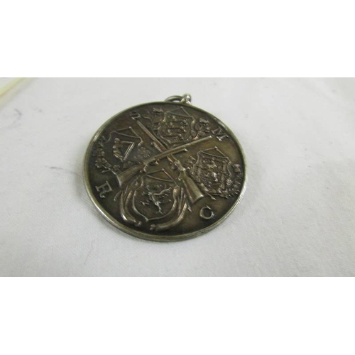 137 - A silver medallion (War Time League 1942-3, 35th Div.), a 1914-18 medal for 18413 Pte. L Hewitt H.R.... 