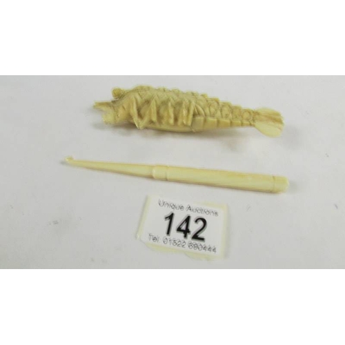 142 - A rare and unusual carved ivory lobster (a/f) and an ivory crochet hook.