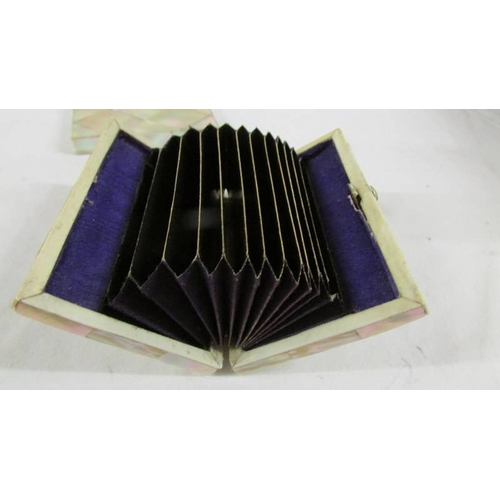 145 - 2 19th century mother of pearl card cases.