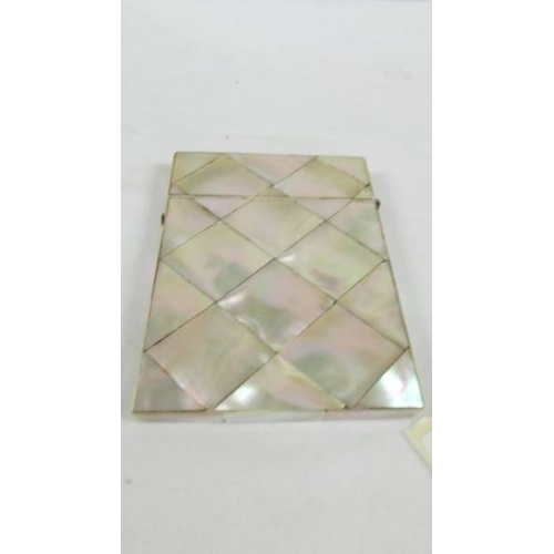 145 - 2 19th century mother of pearl card cases.