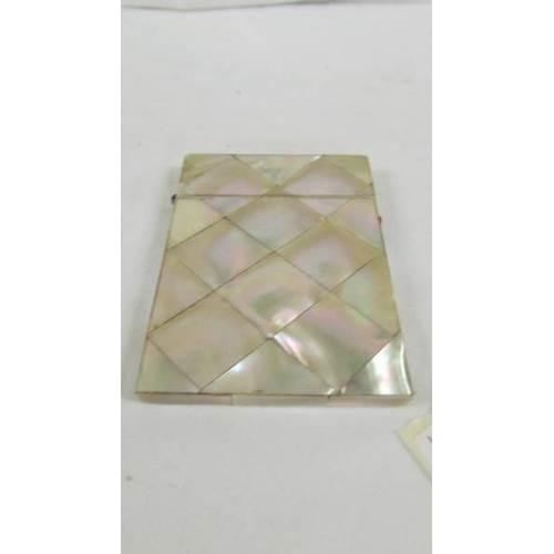 145 - 2 19th century mother of pearl card cases.