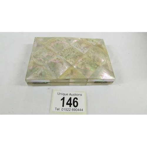 146 - A wallet type mother of pearl card case.