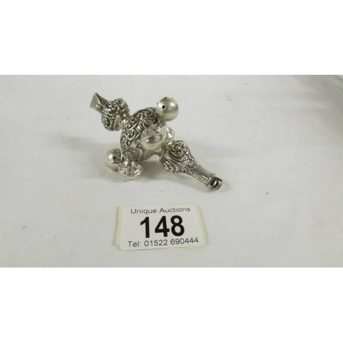 148 - A silver 1903 babies rattle with whistle.