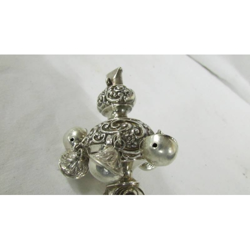 148 - A silver 1903 babies rattle with whistle.