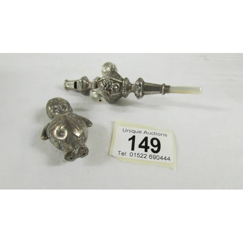 149 - A silver 1906 babies rattle/teether and a silver plate rattle as a policeman.