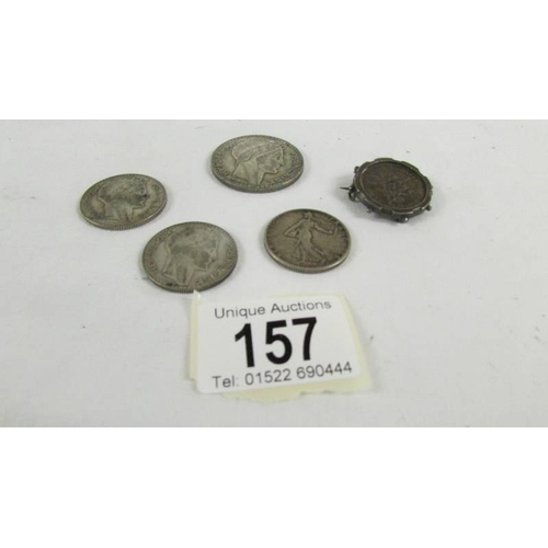157 - A 1933 twenty franc coin, 2 ten franc coins 1930 & 1936, a 1908 2 franc coin and a 1917 1 franc coin