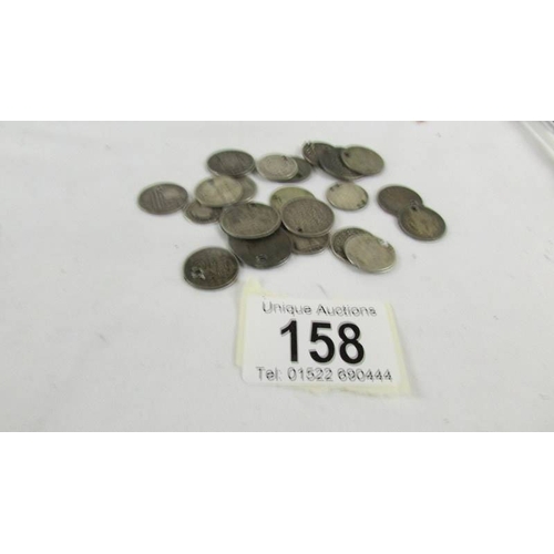 158 - 24 silver coins with holes in, 38 grams.