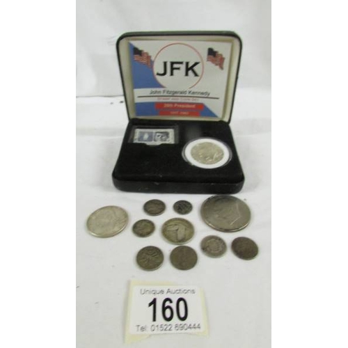 160 - Eleven USA silver coins including 1971 dollar and 1964 JFK stamp and coin set.