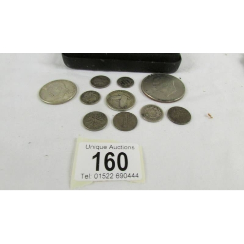 160 - Eleven USA silver coins including 1971 dollar and 1964 JFK stamp and coin set.