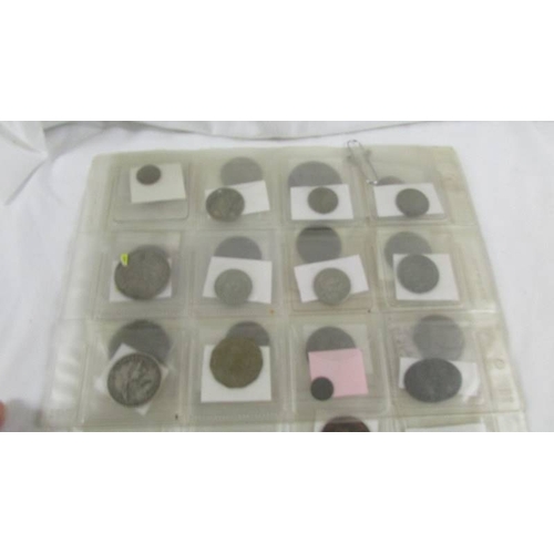 163 - A selection of old tokens, pennies and half pennies.