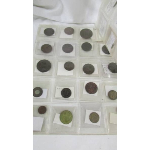163 - A selection of old tokens, pennies and half pennies.