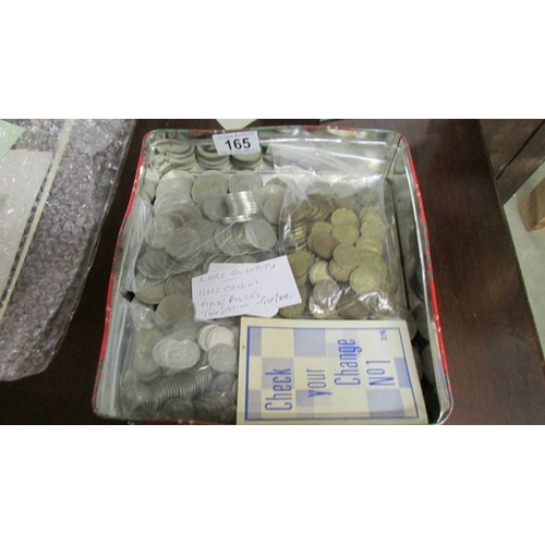 165 - A large quantity of half crowns, florins, sixpences and three penny bits.