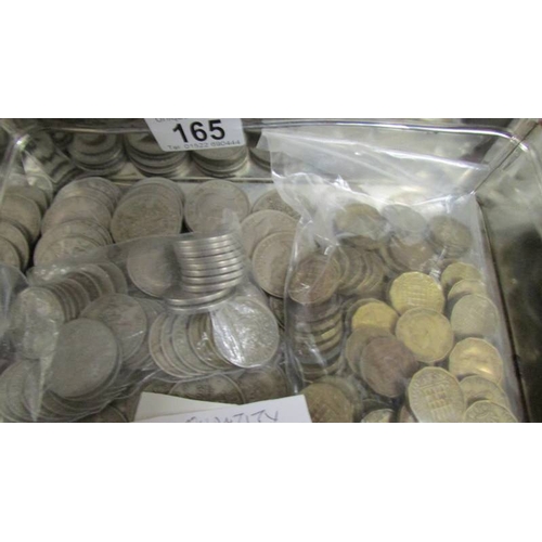 165 - A large quantity of half crowns, florins, sixpences and three penny bits.