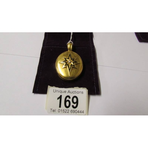 169 - An 18ct gold Victorian mourning locket.  21.5 grams.