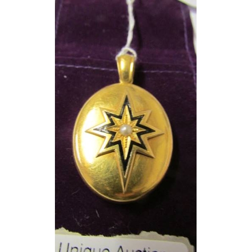 169 - An 18ct gold Victorian mourning locket.  21.5 grams.