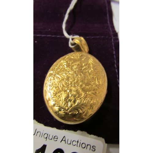169 - An 18ct gold Victorian mourning locket.  21.5 grams.