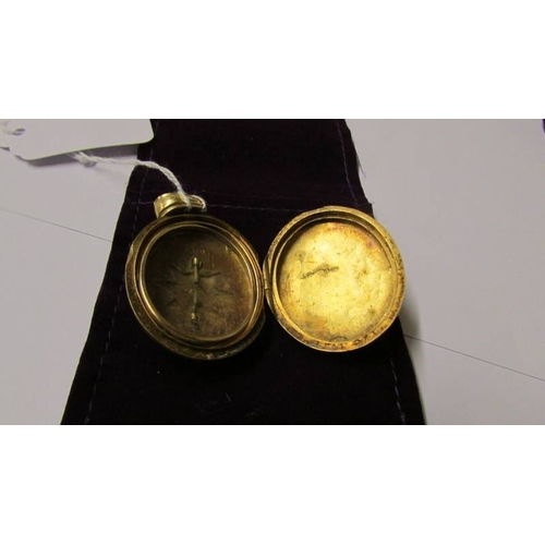 169 - An 18ct gold Victorian mourning locket.  21.5 grams.