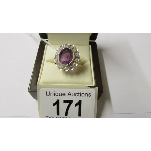 171 - An 18ct gold diamond and amethyst ring, size N.