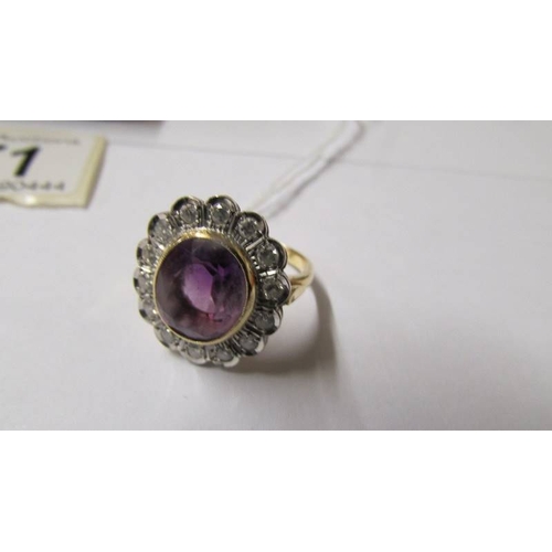 171 - An 18ct gold diamond and amethyst ring, size N.