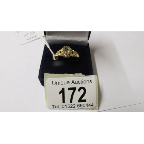 172 - An 18ct gold antique champagne diamond solitaire ring, size Q.