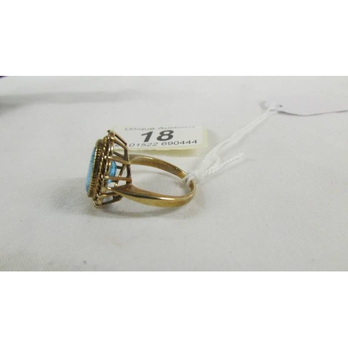 18 - A 9ct gold ring set large blue stone, size T.