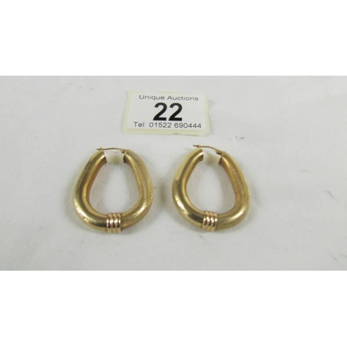 22 - A pair of 9ct gold earrings, 5.5 grams.