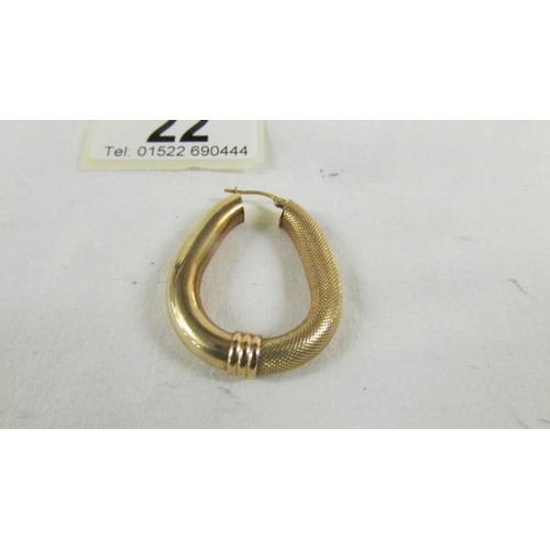 22 - A pair of 9ct gold earrings, 5.5 grams.