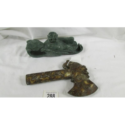 288 - A Chinese archaistic Shang Dynasty-style mottled brown and caramel jade ceremonial axe with mythical... 