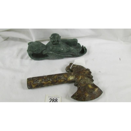 288 - A Chinese archaistic Shang Dynasty-style mottled brown and caramel jade ceremonial axe with mythical... 
