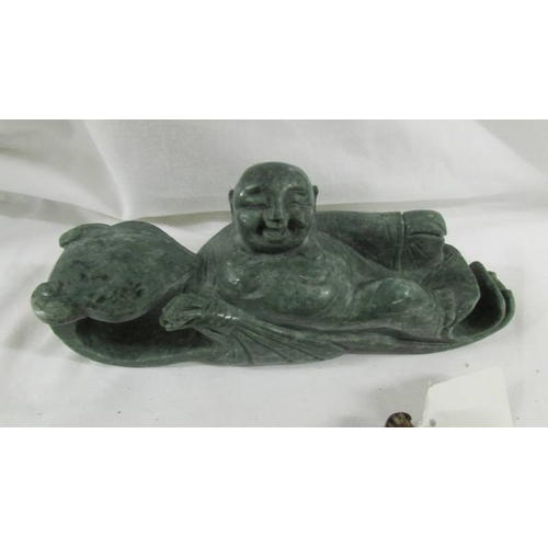 288 - A Chinese archaistic Shang Dynasty-style mottled brown and caramel jade ceremonial axe with mythical... 