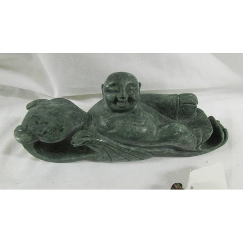 288 - A Chinese archaistic Shang Dynasty-style mottled brown and caramel jade ceremonial axe with mythical... 
