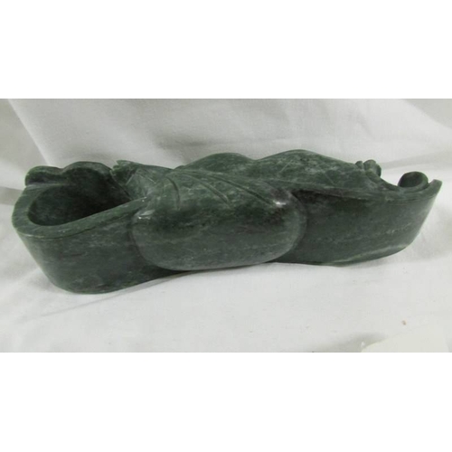 288 - A Chinese archaistic Shang Dynasty-style mottled brown and caramel jade ceremonial axe with mythical... 