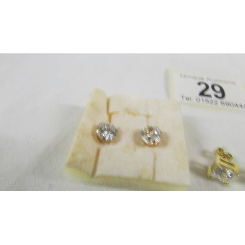 29 - 3 pairs of 9ct gold earrings set cubic zirconia's.