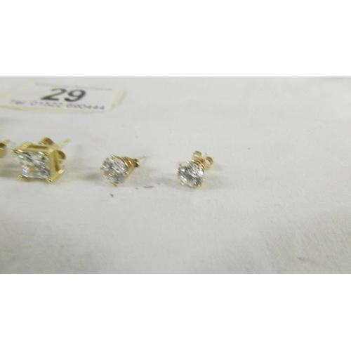 29 - 3 pairs of 9ct gold earrings set cubic zirconia's.