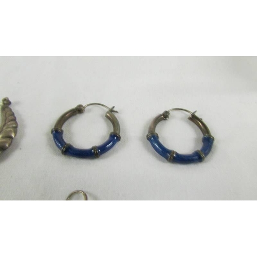 31 - 4 pairs of silver earrings.