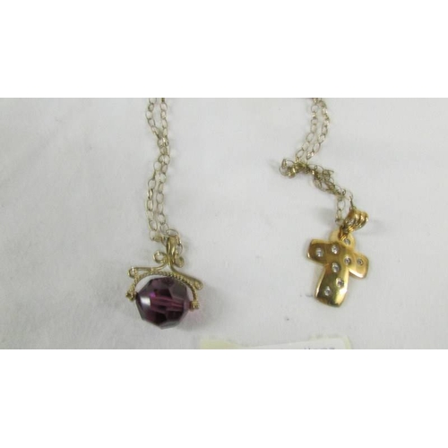 35 - A 9ct gold fob and a 9ct gold cross on a 9ct gold chain,  5.5 grams without fob.