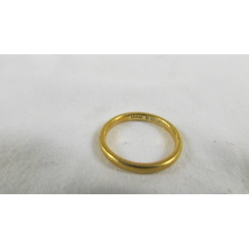 43 - A 22ct gold wedding ring, size L, 3.5 grams.