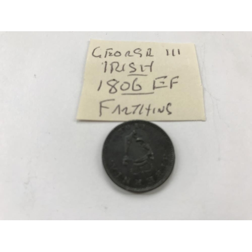 156 - A George 1 1724 half penny, A George III 1806 EF farthing and a Lundy 1929 one puffin coin, all Iris... 