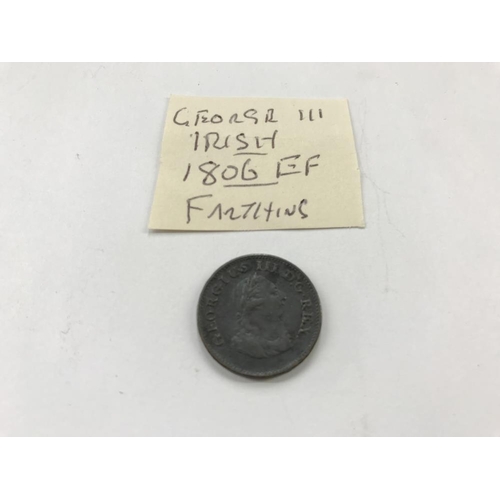 156 - A George 1 1724 half penny, A George III 1806 EF farthing and a Lundy 1929 one puffin coin, all Iris... 