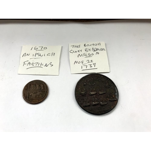 163 - A selection of old tokens, pennies and half pennies.