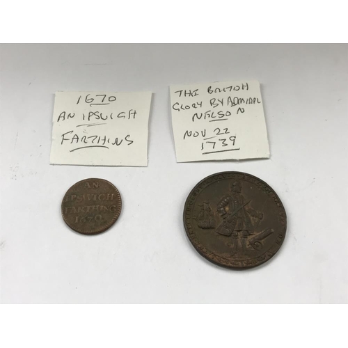 163 - A selection of old tokens, pennies and half pennies.