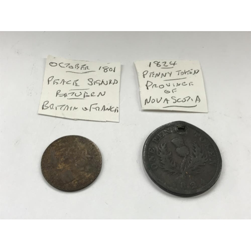 163 - A selection of old tokens, pennies and half pennies.