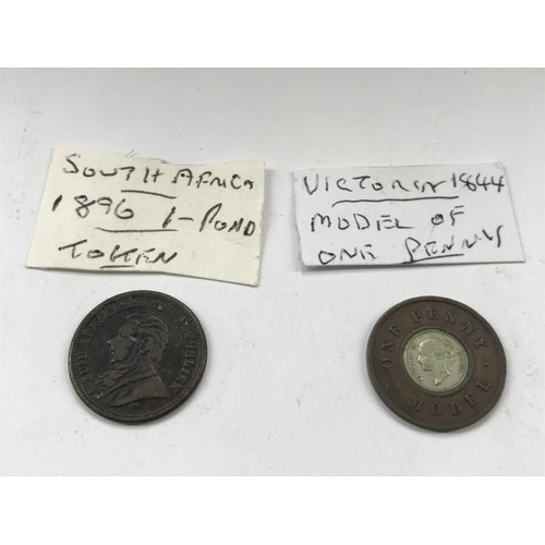 163 - A selection of old tokens, pennies and half pennies.