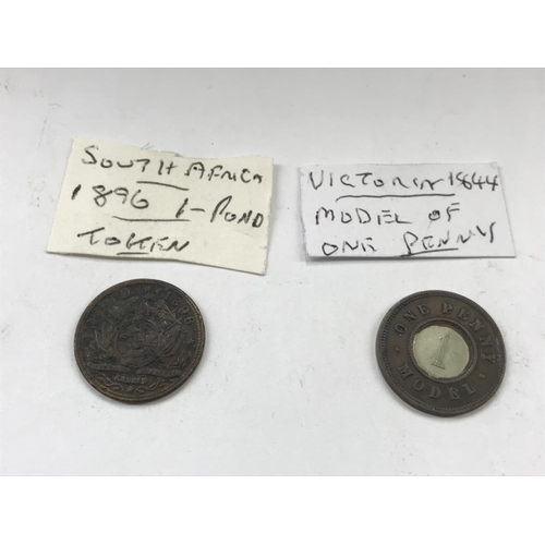 163 - A selection of old tokens, pennies and half pennies.