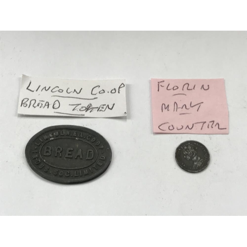 163 - A selection of old tokens, pennies and half pennies.